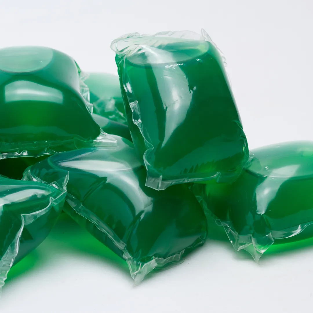 Cápsulas de detergente verdes